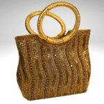 Aurora Gilded: Exquisite Golden Purse with Intricate Work | Surbhi's Couture