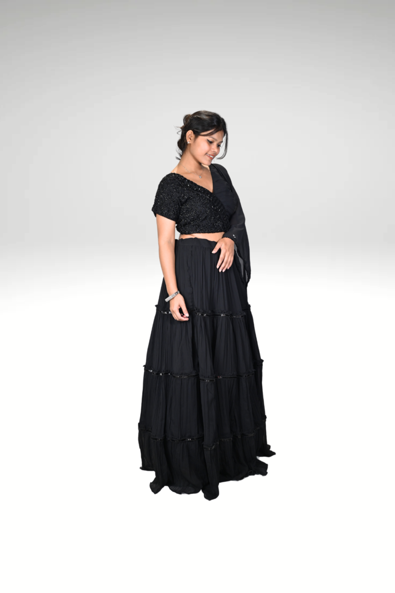 Ebony Ruffles: The Black Lehenga with Frill Sleeve Blouse