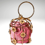 Golden Blossom: Baby Pink Purse with Luxurious Golden Cage Cell Work | Surbhi's Couture